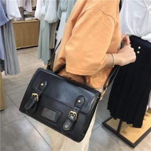 sac besace à main bandoulière cuir à rabat