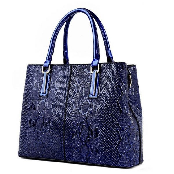 sac besace cuir serpent élégant